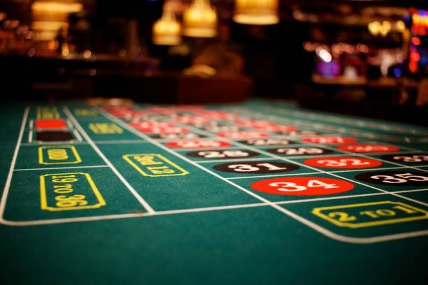 Mobile app interface showing sportsbook, live-dealer tables, slots, and esports category tabs