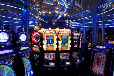 Phoenix Rises slot reels spinning with flame animations and gold symbol highlights
